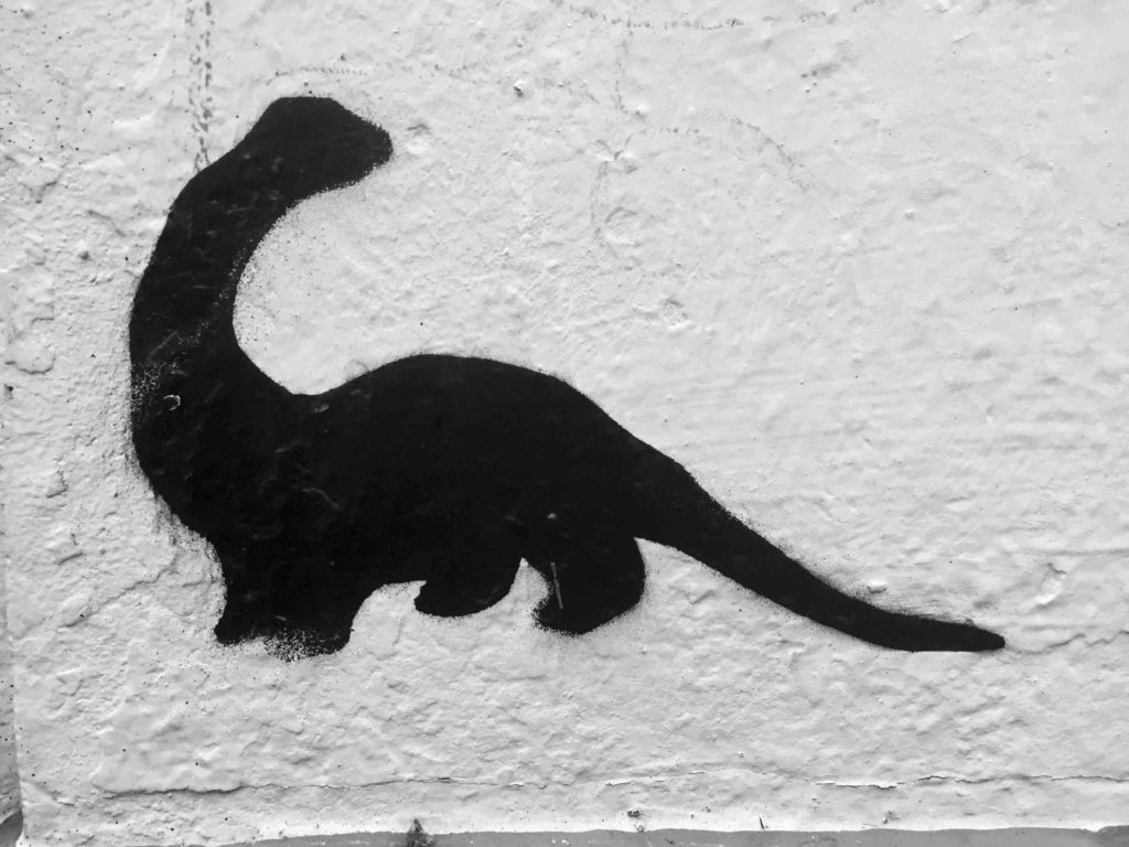 Graffito Dinosaurier / grafito: dinosaur in Bielefeld, Foto: Robert B. Fishman